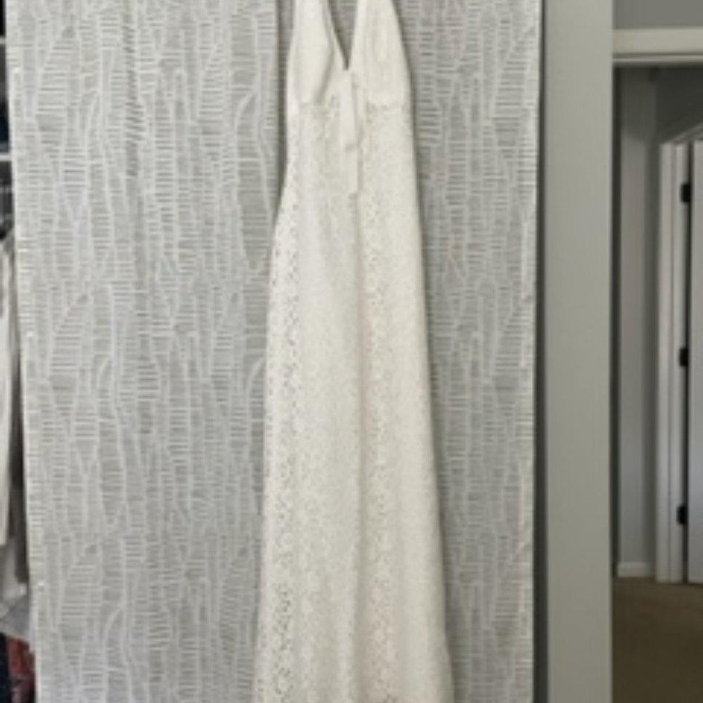 White cotton and lace wedding dress with satin underlay
